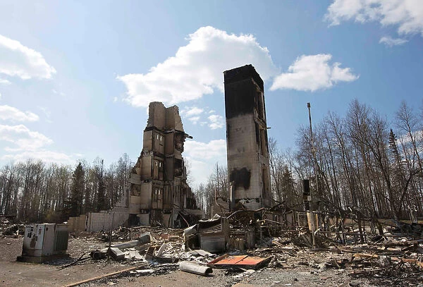 The devastated neighbourhood of Abasand is shown after being ravaged by a wildfire in