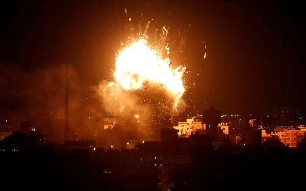 Explosion is seen during an Israeli air strike on Hamass television station