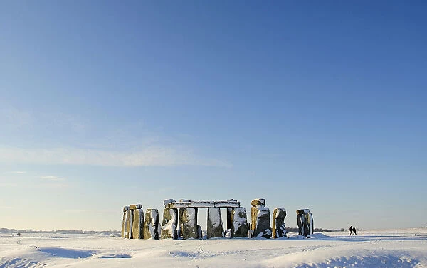 Fallen snow rests on Stonehenge in Salisbury, southern England