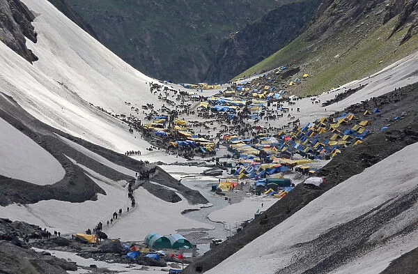 Hindu pilgrims arrive to worship at the holy cave of Lord Shiva in Amarnath