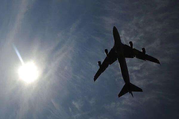 A jumbo jet takes off shortly after midday in London