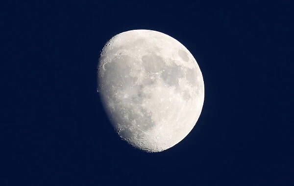 A moon in its waxing gibbous phase shines above Harpenden