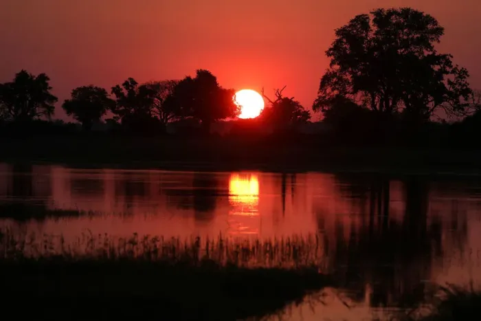 Framed Print : The Sun Sets Over Okavango Delta Print Framed Print : The Sun Sets Over Okavango Delta Print