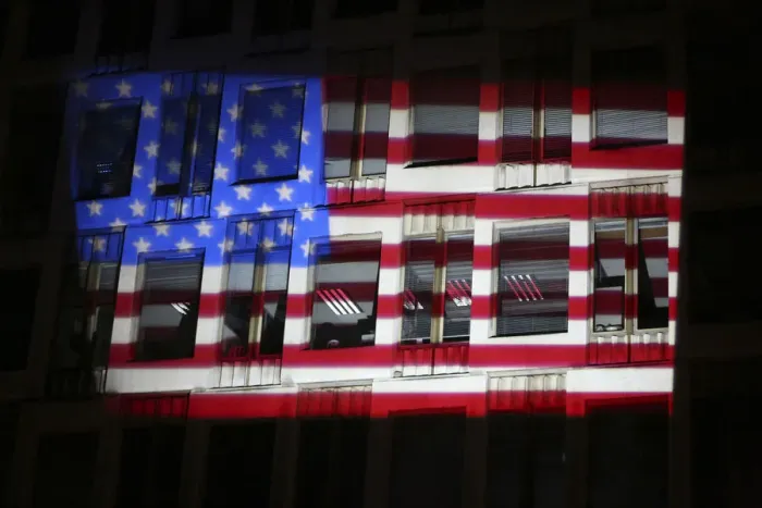Framed Print : U.S. flags projected on embassy facade print, London, 2012 Framed Print : U.S. flags projected on embassy facade print, London, 2012