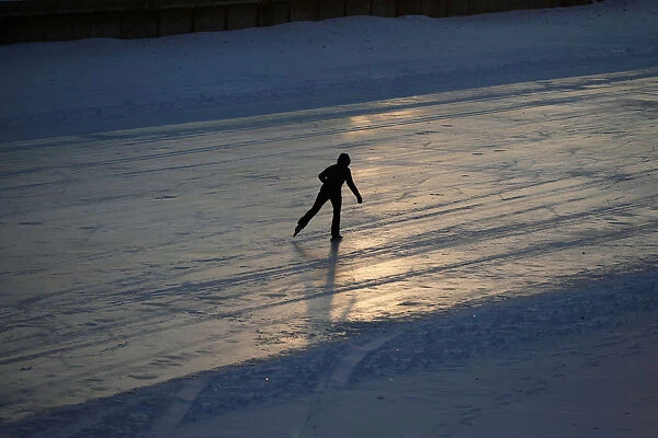 Person skates on the Rideau Canal in Ottawa