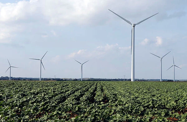 Power-generating wind turbines are seen near the city of Mouchamps