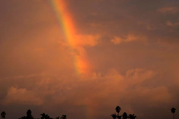 A rainbow appears in the sky after a rainstorm in Encinitas, California