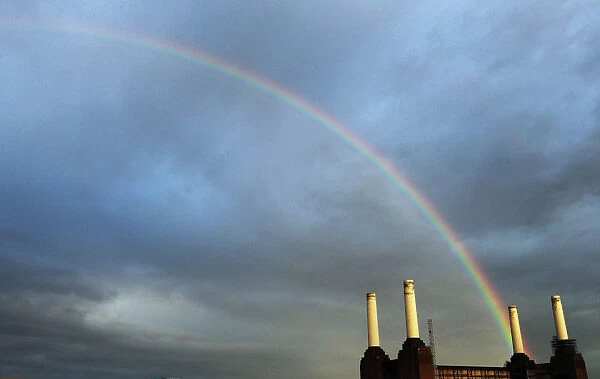 A rainbow stretches over Battersea Power Station in London