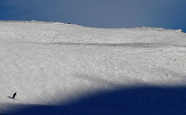 A skier descends the mountain in Glenshee, Scotland