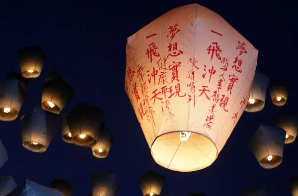 Sky lanterns are released ahead of the traditional Chinese Lantern Festival in Pingxi