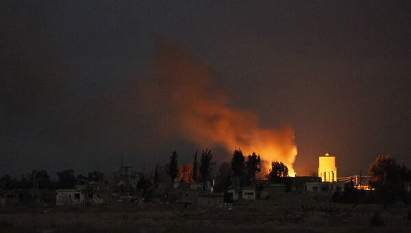 Smoke rises due to clashes between Free Syrian Army fighters