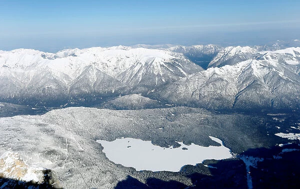 Snow covered Eibsee is pictured in Grainau