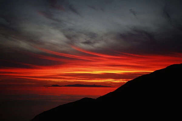 The sun sets over the Pacific Ocean in Point Mugu State Park