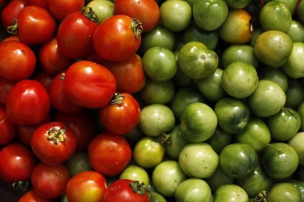 Tomatoes are seen at a market in Jakarta