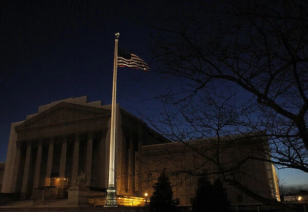 The United States Supreme Court is seen before dawn in Washington