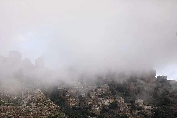 Village is shrouded by fog in the mountainous district of Haraz
