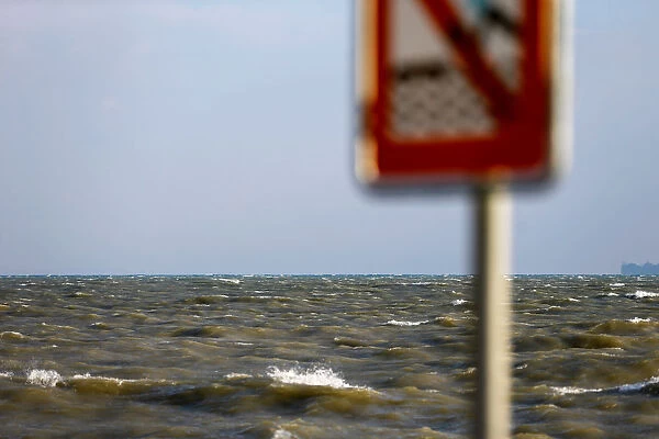 Waves are seeing on the Lake of Geneva during a windy day in Geneva