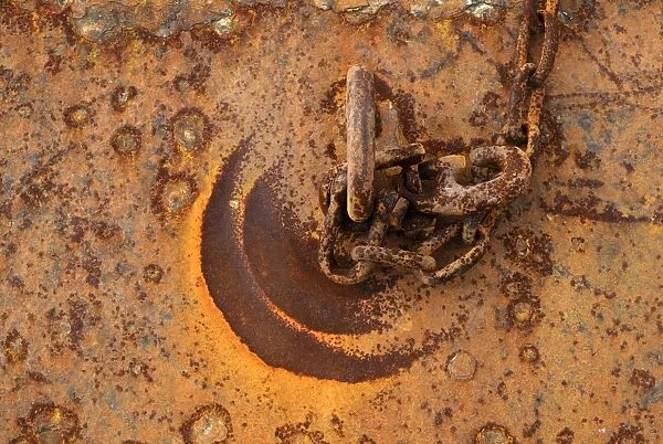 Close-up of rusted metal chain and loop in harbour, Granville, Manche, Basse-Normandie, Normandy, France, October