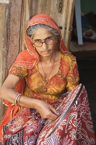 Indian woman with embroidery, Rajasthan, India, December