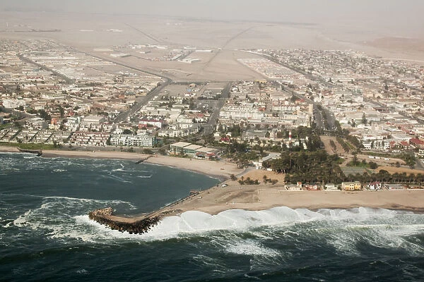 Africa, Namibia, Swakopmund. Aerial view of the city and bay