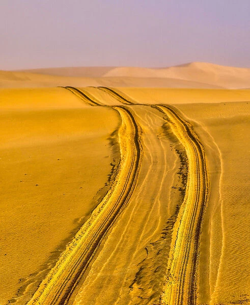 Africa, Namibia, Tire Tracks in the Desert outside Swakopmund