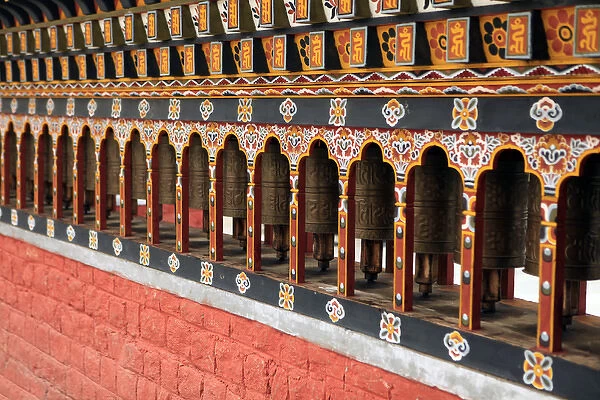 Asia, Bhutan, Thimpu. Prayer Wheels of the cnetral square in Thimpu