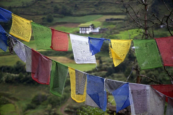 Asia, Bhutan, Trongsa. Landscape and prayer flags scene of Bhutan