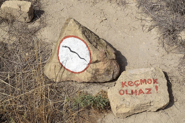 Azerbaijan, Qobustan. A warning to watch out for snakes at Gobustan National Park