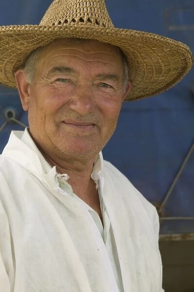 Bee keeper man in hat, Romania, Danube Delta MR