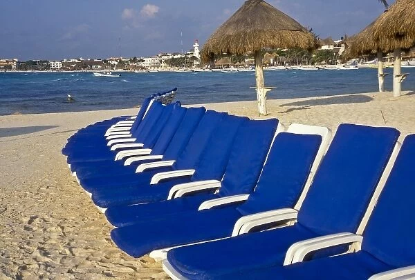 Blue Chairs on the sandy beach at Playa del Carmen; Yucatan Peninsula; Mexico