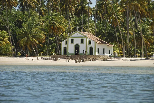 Brazil, Pernambuco, Praia dos Carneiros, little church on the beachamid the vegetation