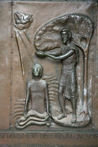 Bronze relief of Jesus healing power to restore on entrance door to Nazareth s