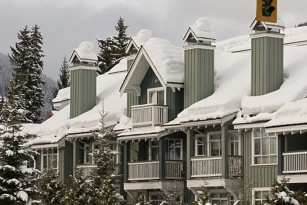 CA, BC, Whistler  /  Blackcomb resort. Lodging in Whistler Village laden with fresh snow