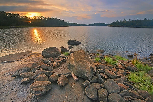 Canada, Ontario, Kenora. Middle Lake at sunrise. Credit as
