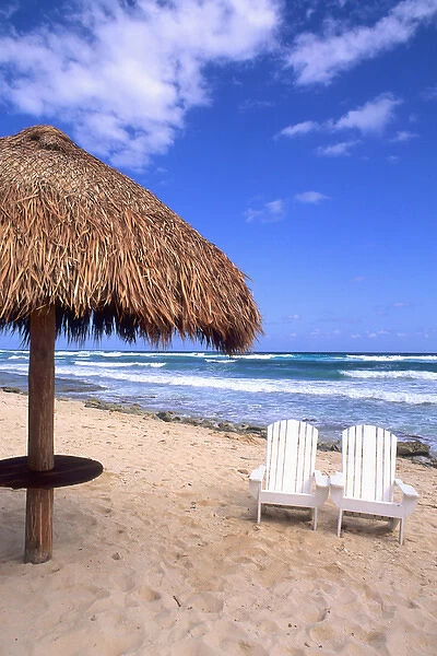 Chairs on beautiful beach in Cozumel Mexico