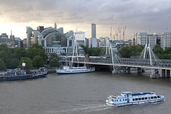Charing Cross railway station at the north end of the Hungerford Bridge and Golden