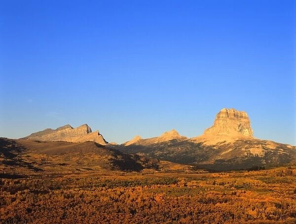 Chief Mountain and Yellow Mountains in autumn in Glacier National Park in Montana
