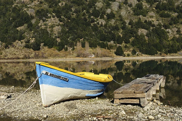 Chile, Aysen, Bertrand, Baker River. Fishing boat on the shore of Lago Bertrand