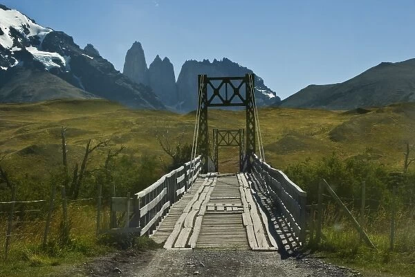 Chile, Patagonia, Torres del Paine National Park. A narrow wooden bridge allows the