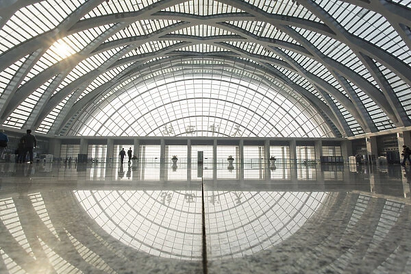 China, Tianjin, Reflections inside cavernous and nearly empty interior of newly built