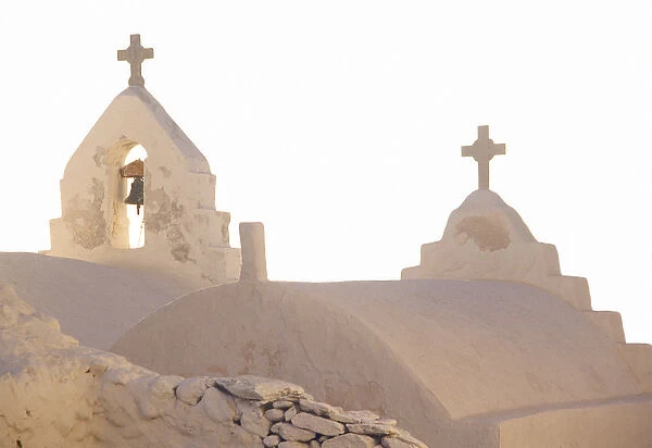 Europe, Greece, Cyclades, Mykonos. Bell of Greek Orthodox Church. Credit as: Nancy