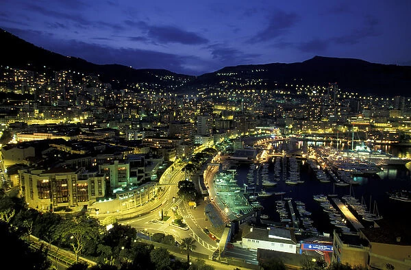 Europe, Monaco. View of port looking towards Monte Carlo, evening
