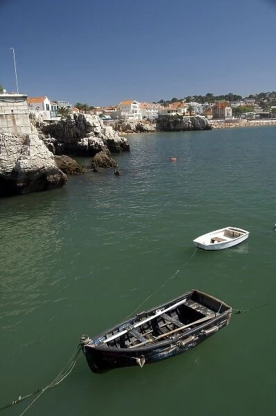 Europe, Portugal. Seaside city of Cascais, coastal view with rowboat