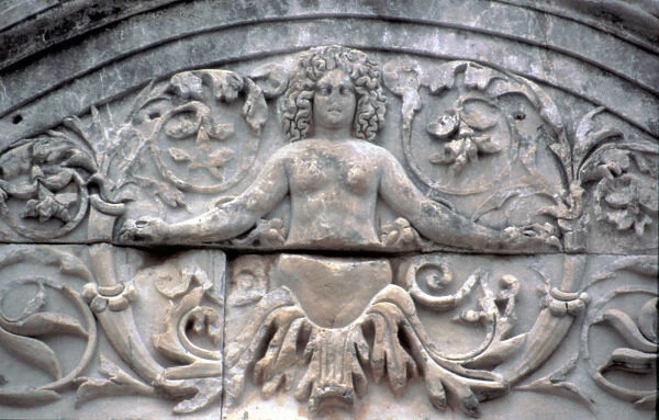Europe, Turkey, Ephesus. Marble Roman carving of a goddess on a ruin