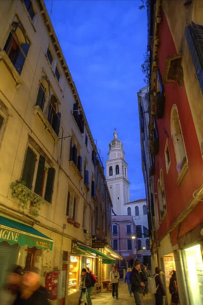 Evening street scene with Bell Tower in background, Venice Italy
