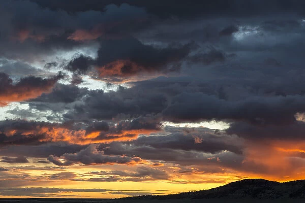 Fiery sunrise light over Pine Butte along the Rocky Mountain Front near Choteau, Montana