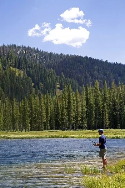 Fishing Bull Trout Lake located in the Boise National Forest near Lowman, Idaho, USA