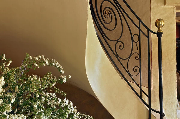 Flowers and sprial stairway, Provence region of Southern France