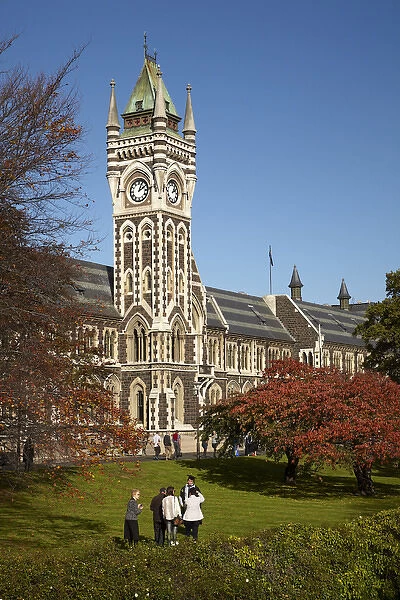 Graduation photos in front of the Clock Tower, Registry Building, University of Otago in Autumn