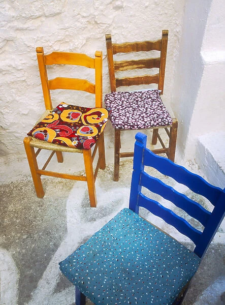 Greece, Nissyros. Three chairs on patio. Credit as: Jim Nilsen  /  Jaynes Gallery  /  DanitaDelimont